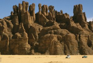 The Ennedi Massif, expedition cars in front of the massif, Explore Chad