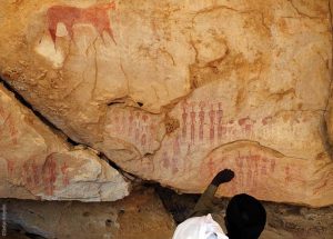 The Ennedi Massif, prehistoric rock art depicting human figures, Explore Chad